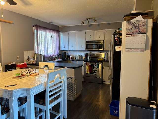 Property Photo: 19 Lakeview Crescent AB T4S 1J8