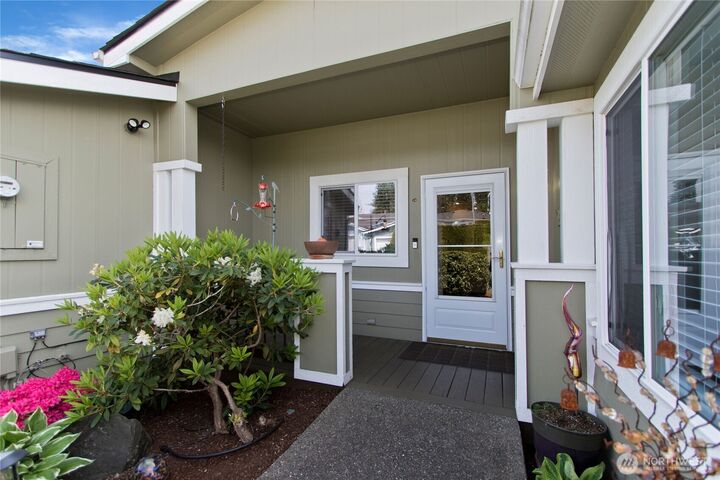 Property Photo:  21609 SE 273rd Place 151  WA 98038 