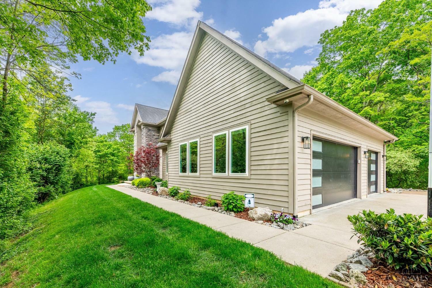 Property Photo: 1115 Raintree Drive OH 45150