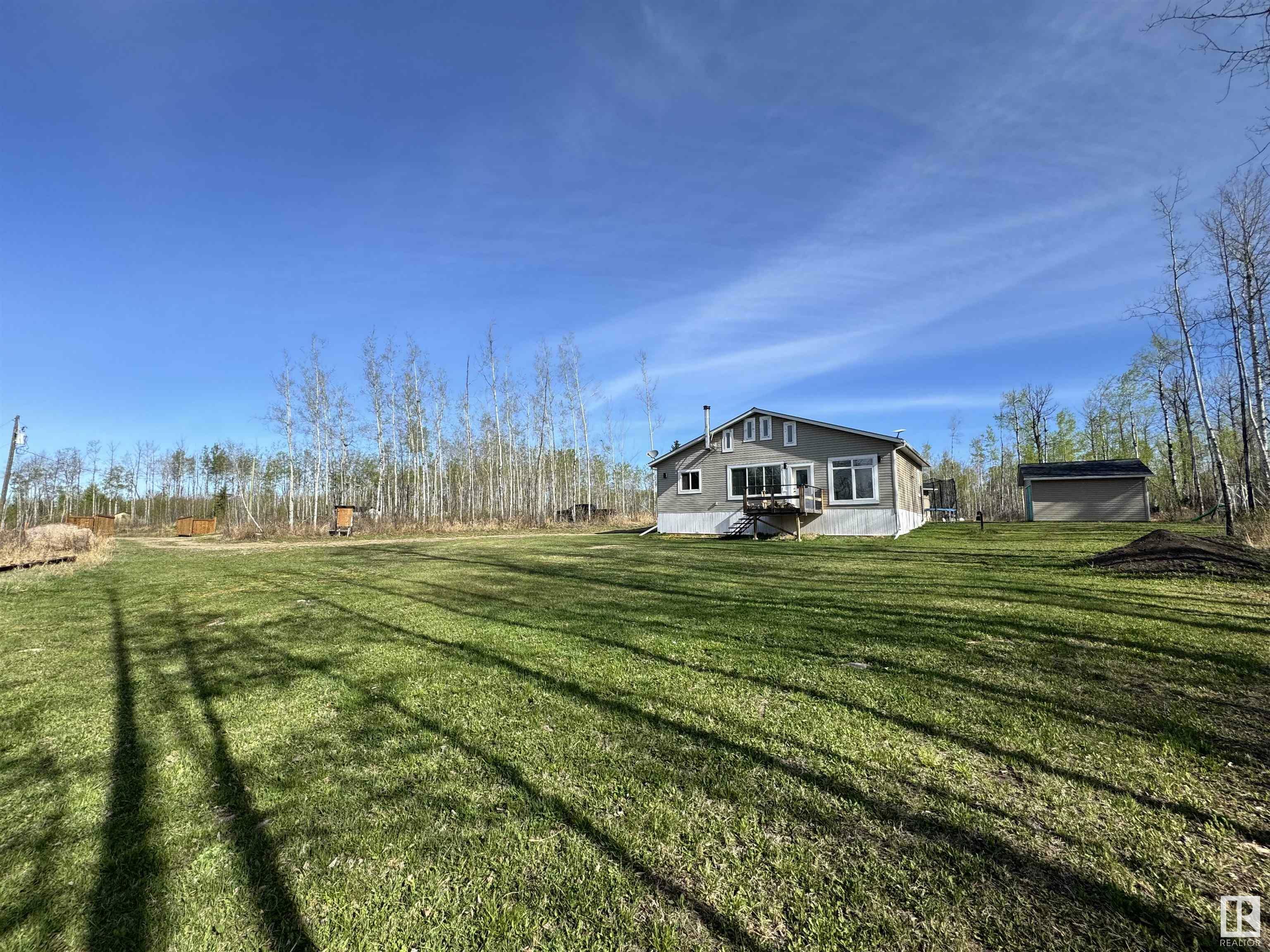 Property Photo: 18 184015 Bondiss Drive AB T0A 0M0
