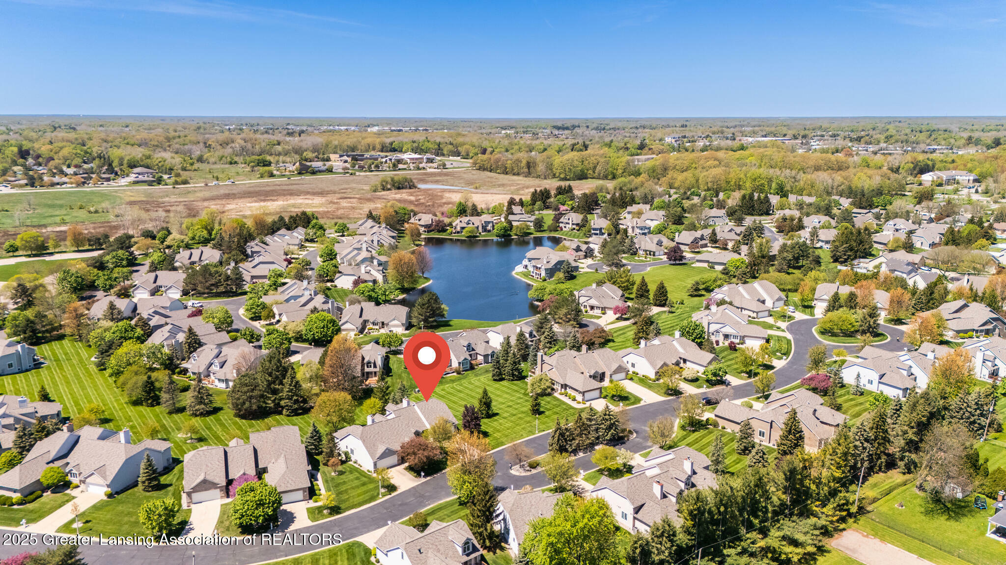 Property Photo: 514 Burgenstock Drive MI 48917