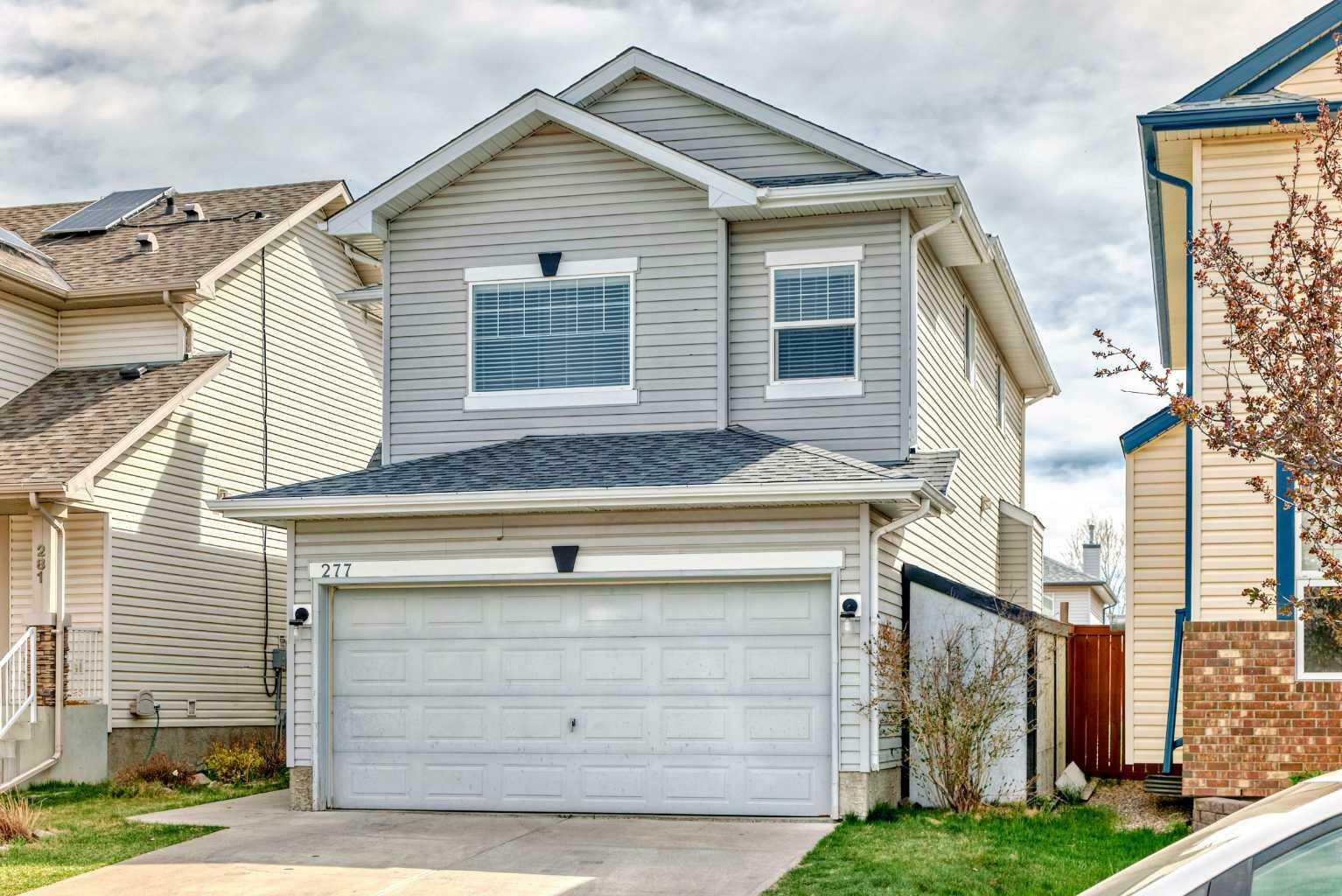 Property Photo: 277 Covewood Circle NE AB T3K 5S8