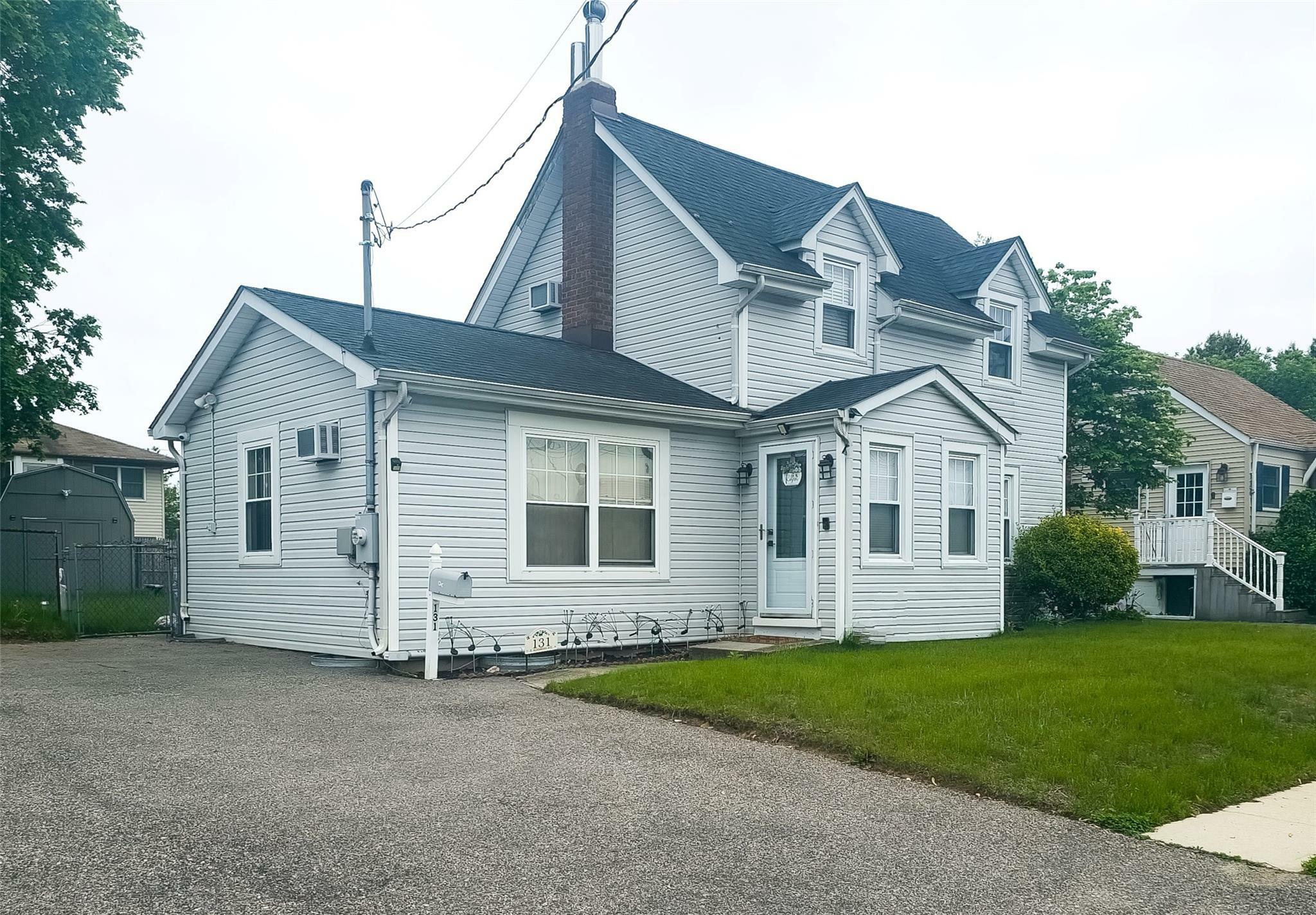 Property Photo: 131 E Alhambra Avenue NY 11757