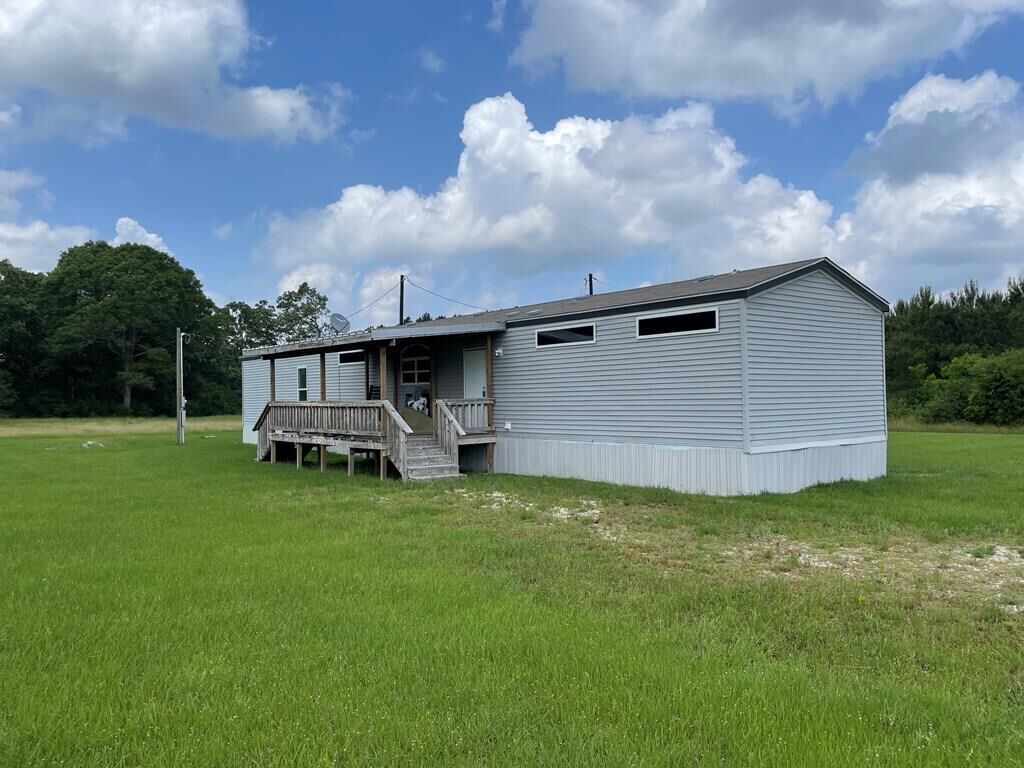 Property Photo: 11312 County Road 3253 TX 75946
