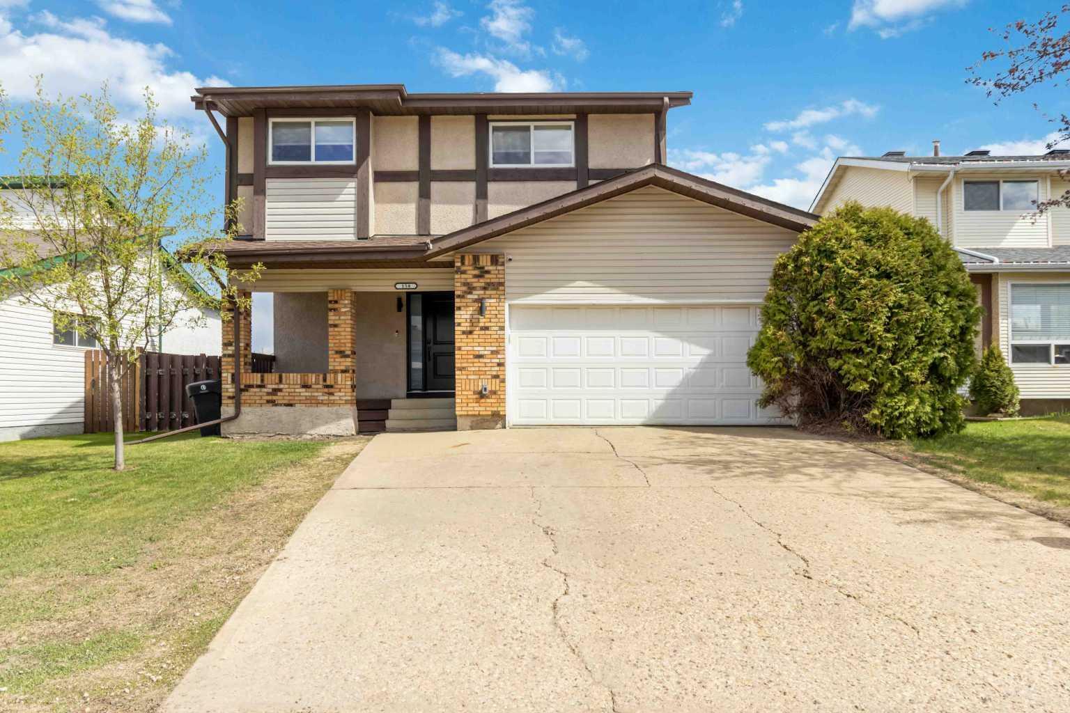 Property Photo: 158 Woodland Drive AB T9K 1R3