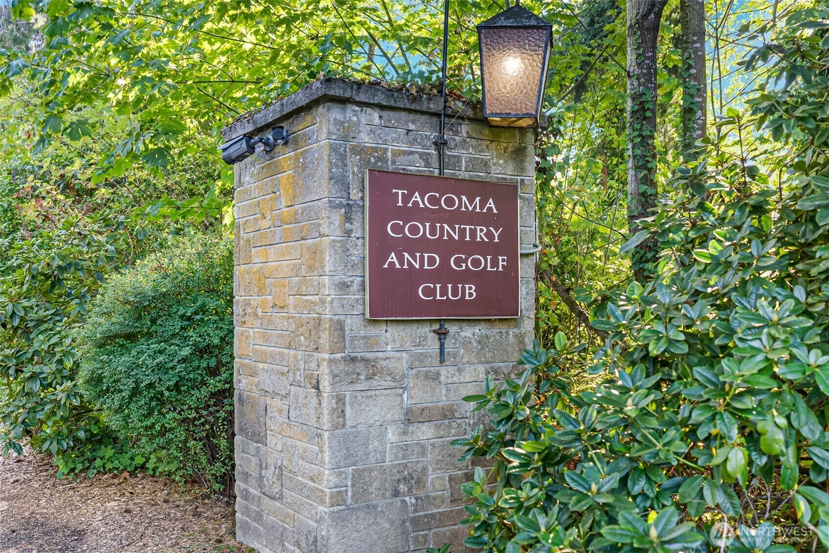 Property Photo: 13140 Country Club Drive SW 203 WA 98498