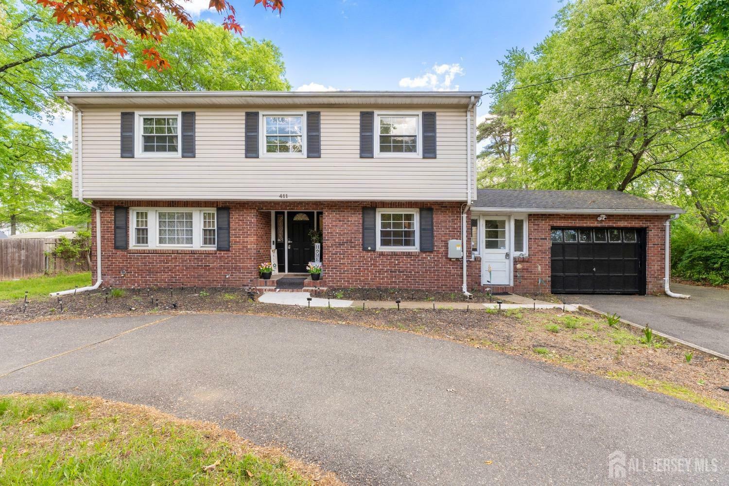 Property Photo: 411 Manalapan Road NJ 08884