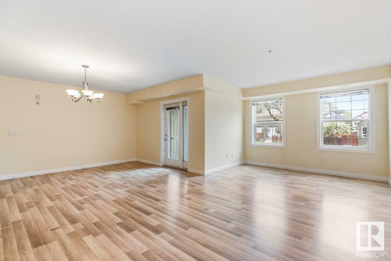 Property Photo: 9739 92 Street NW 102 AB T6C 3S3