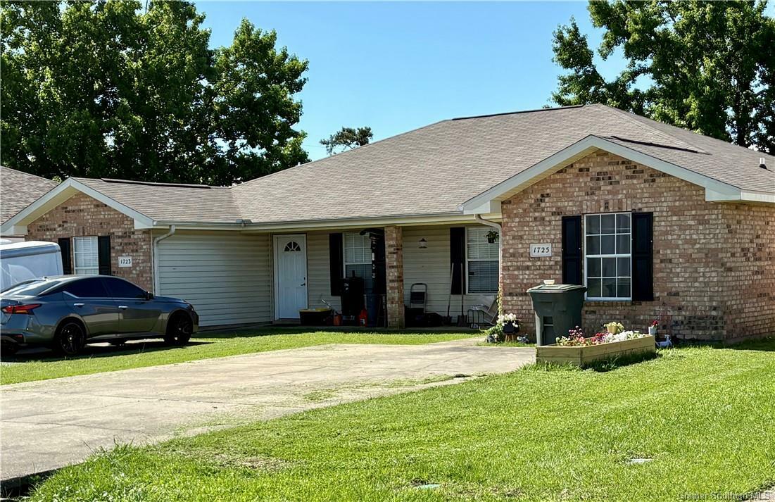 Property Photo: 1723 N Tallowood Drive LA 70605