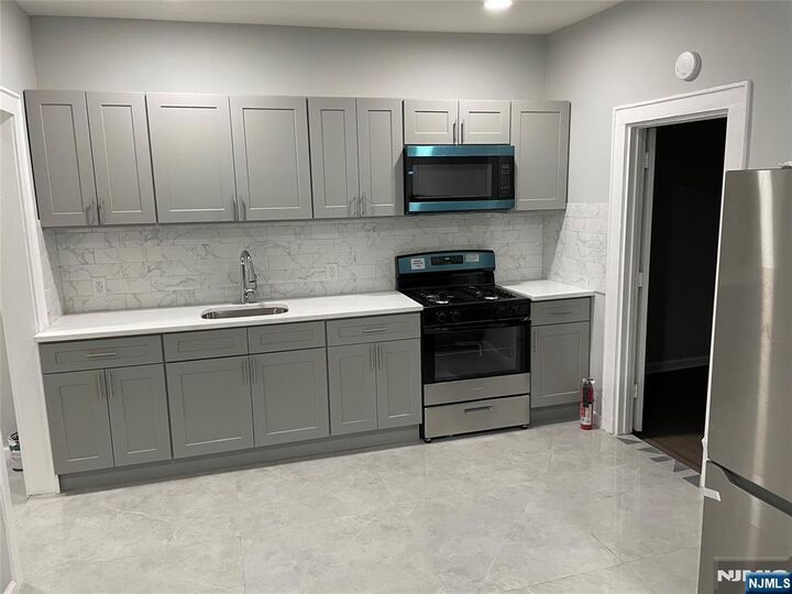 Property Photo:  422 Avenue C  NJ 07002 