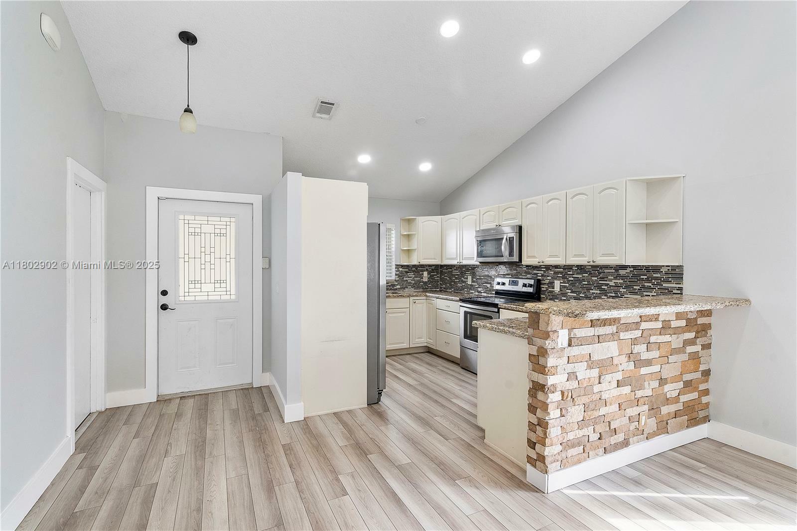 Property Photo: 38 E Tara Lakes Dr E FL 33436