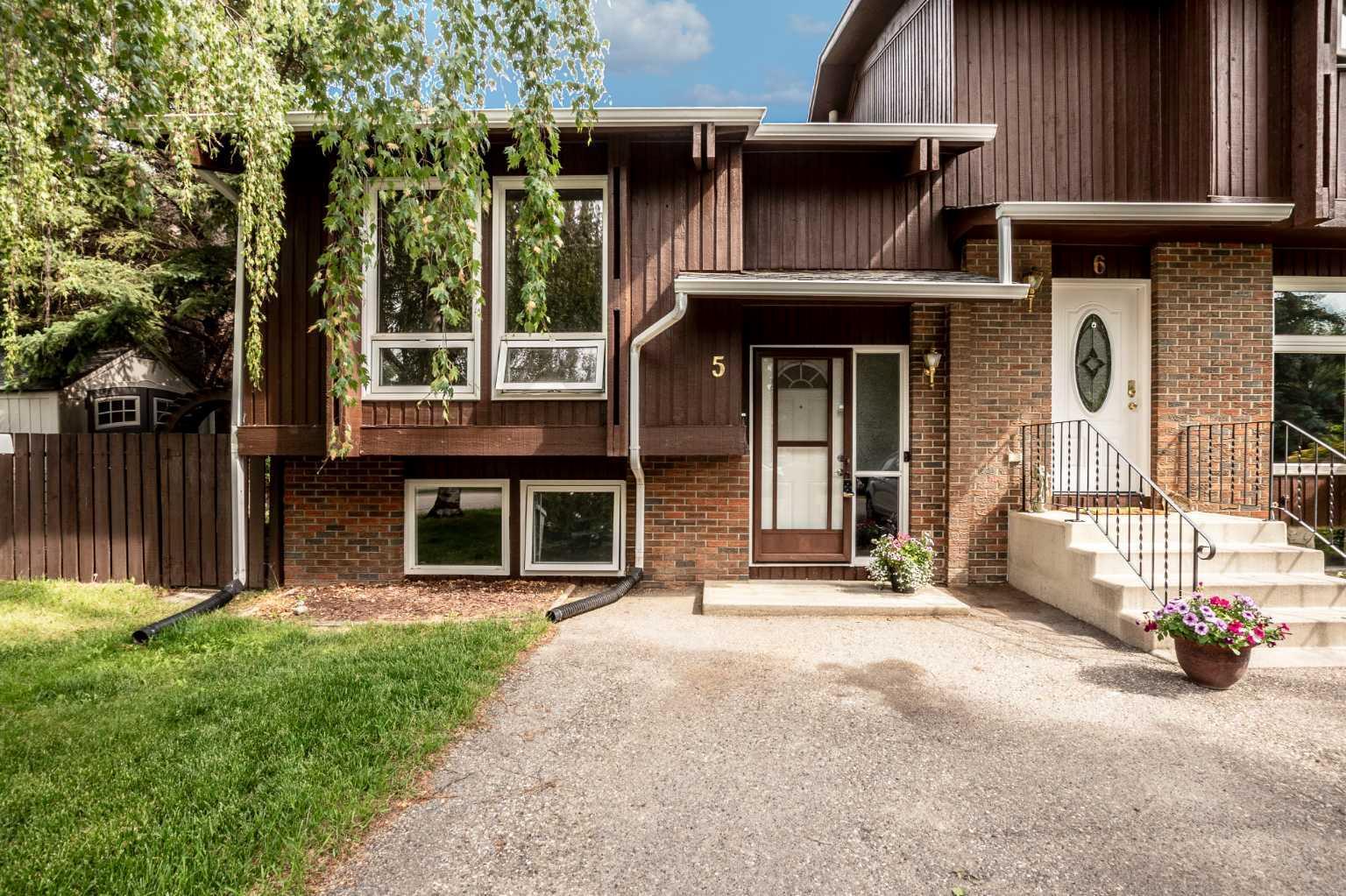 Property Photo: 5 Pekisko Road SW AB T1V 1C6