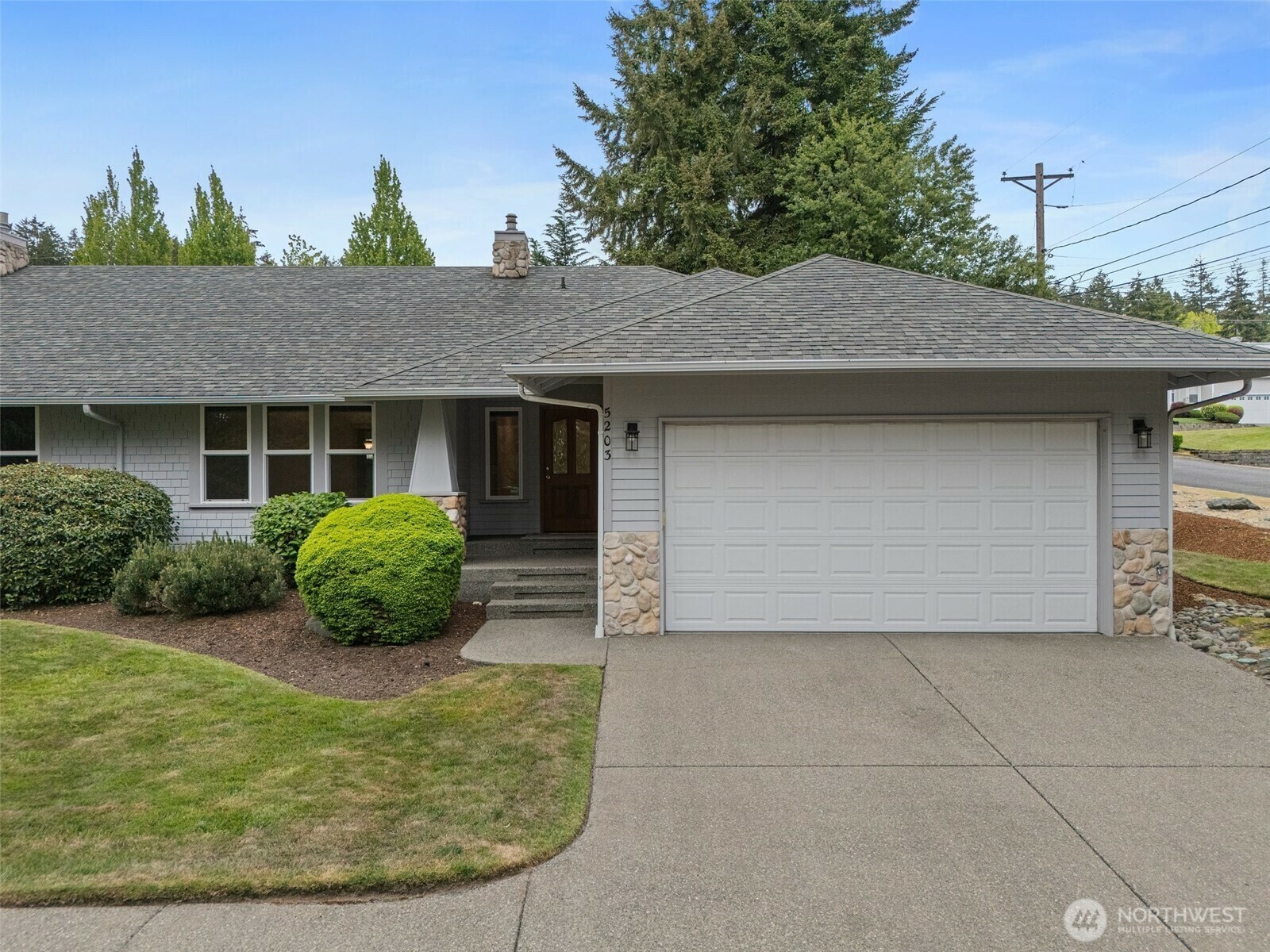 Property Photo: 5203 53rd Street W (#203) WA 98467