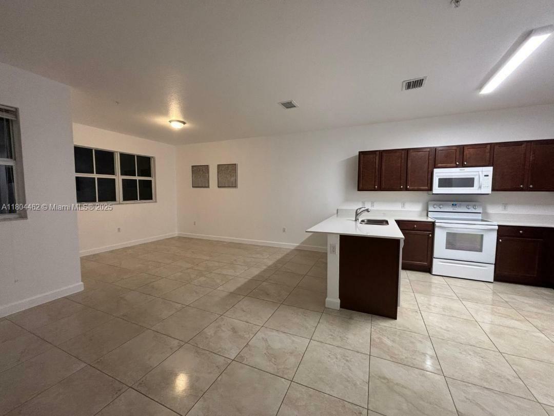 Property Photo: 210 NW 109th Ave 205 FL 33172