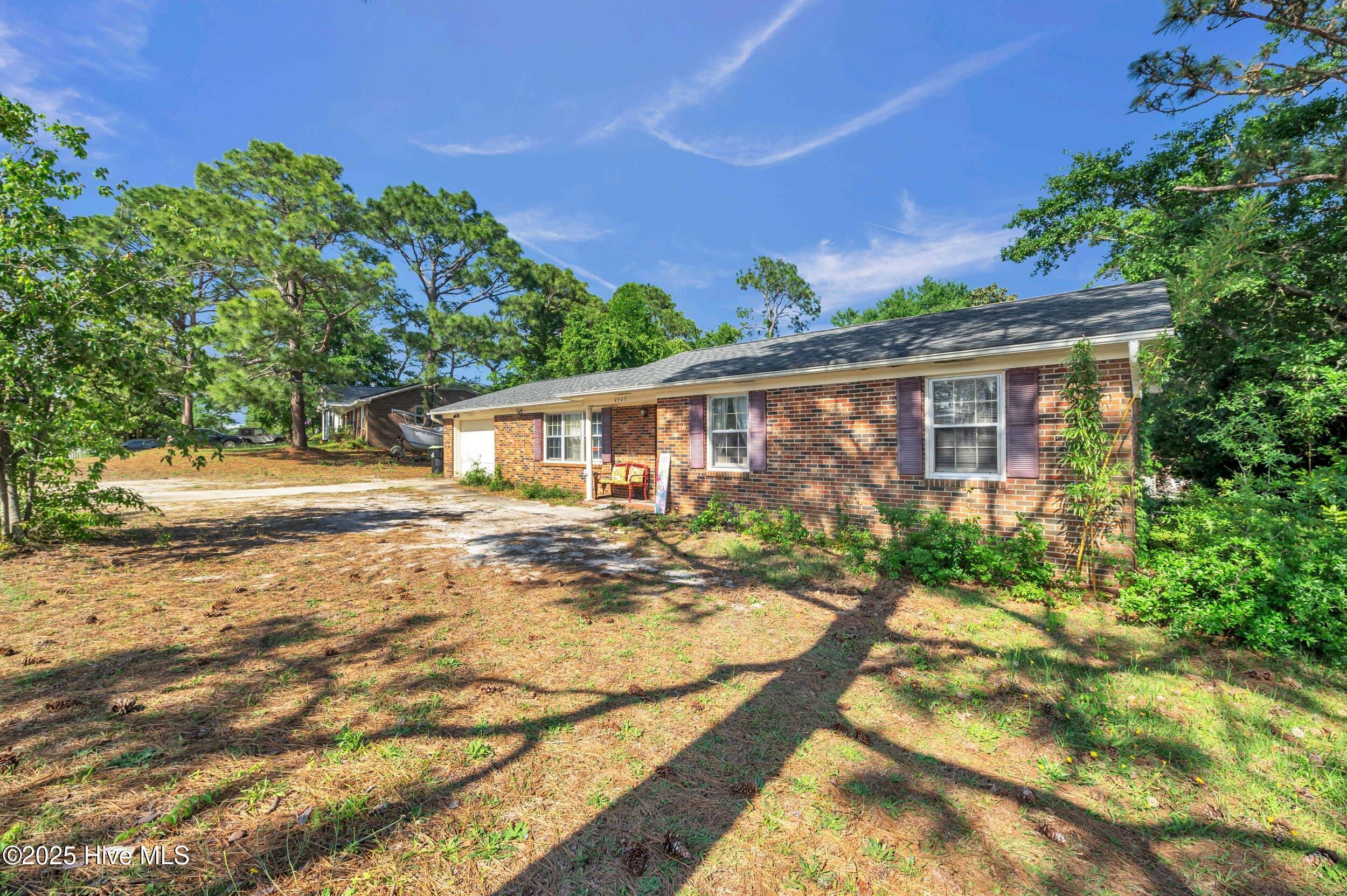 Property Photo:  4945 Wilderness Road  NC 28412 