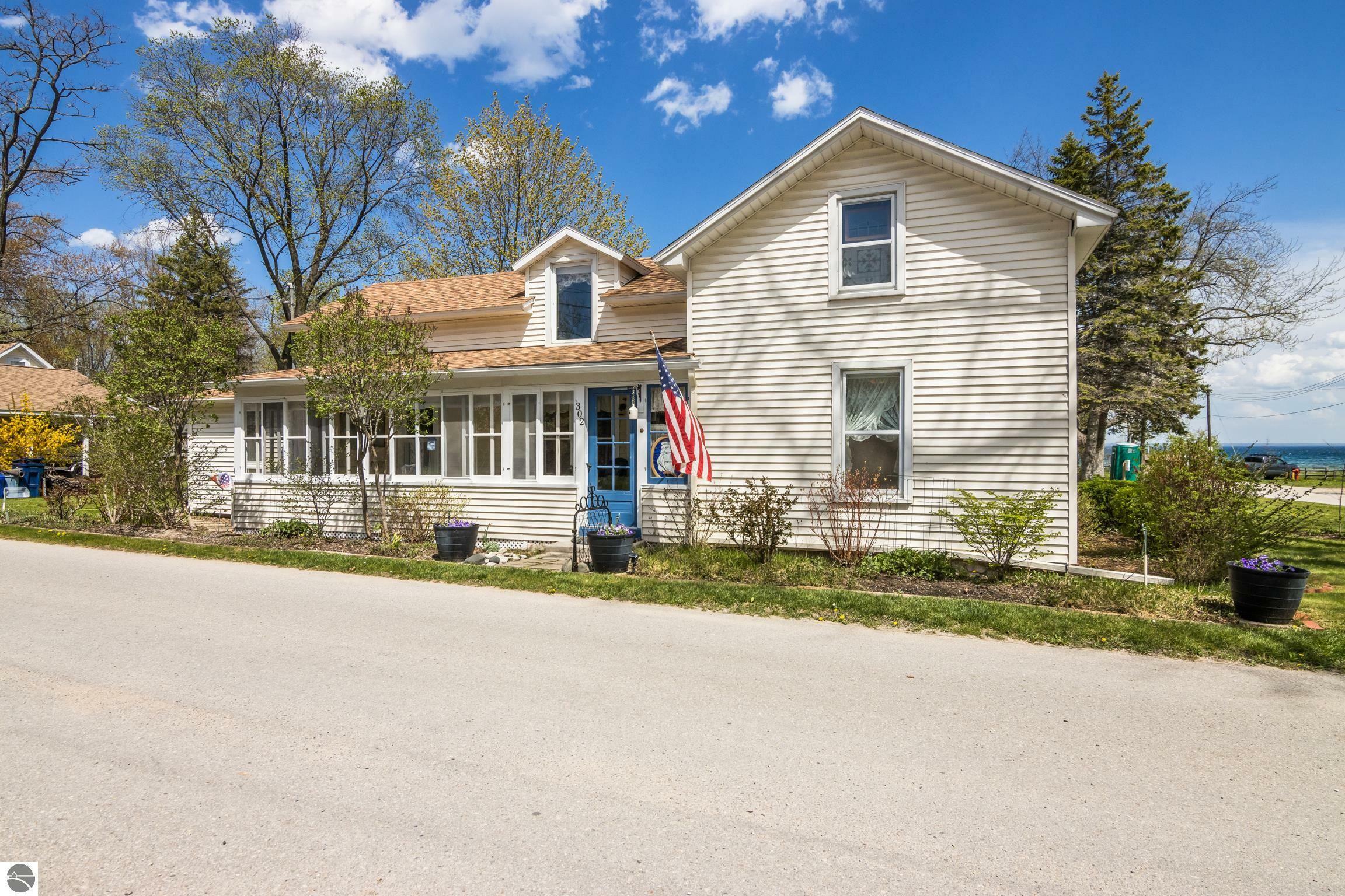 Property Photo:  302 N Rose Street  MI 49670 