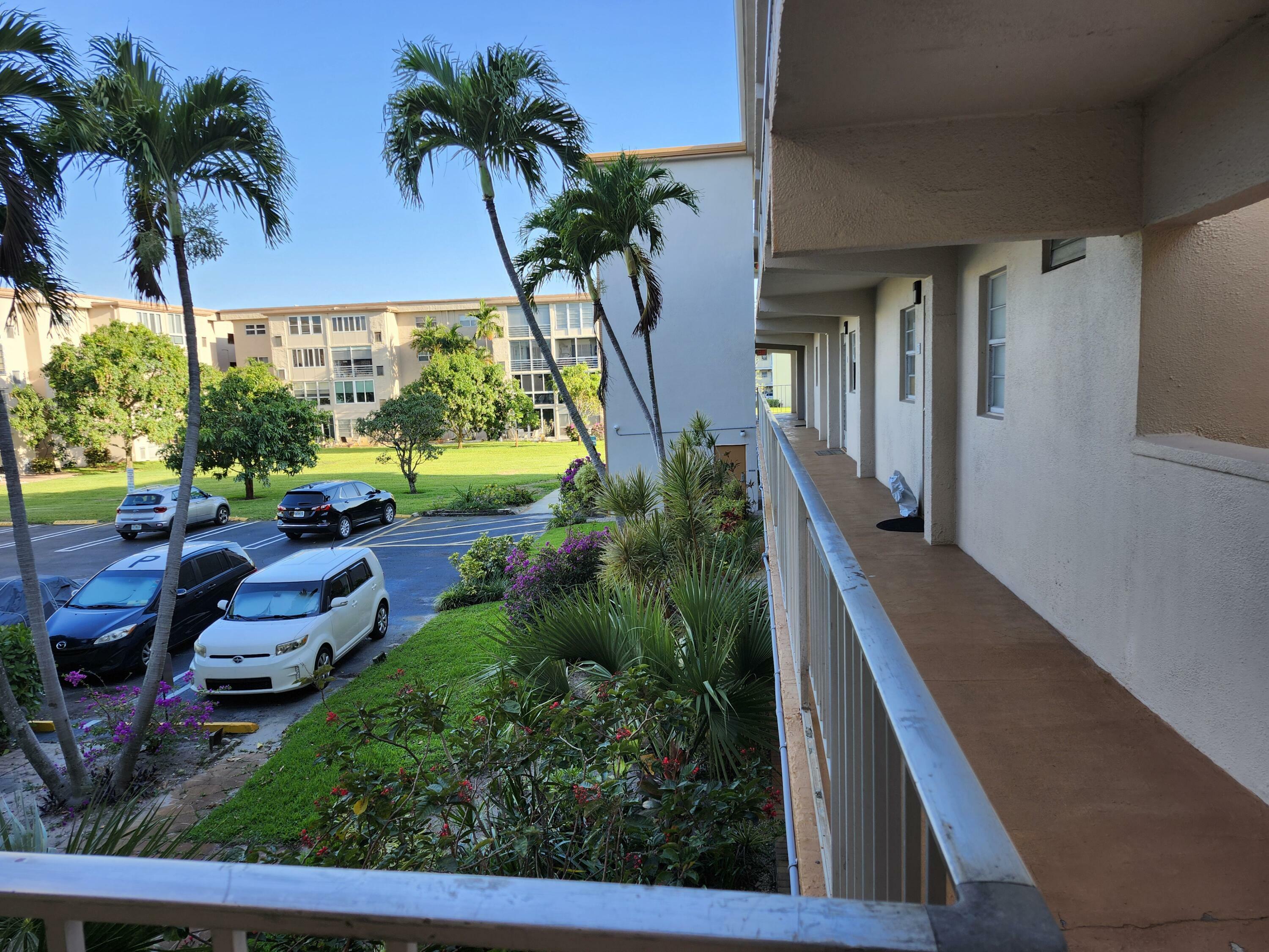Property Photo:  230 NE 26th Avenue 216  FL 33435 