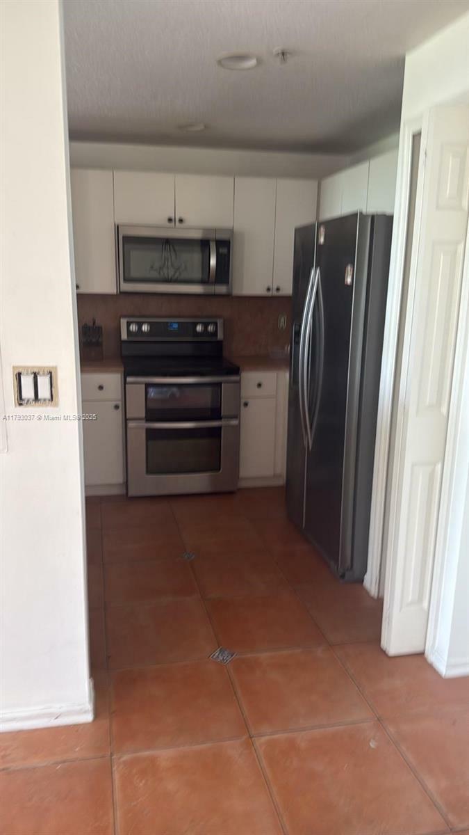 Property Photo: 6520 NW 114th Ave 1637 FL 33178