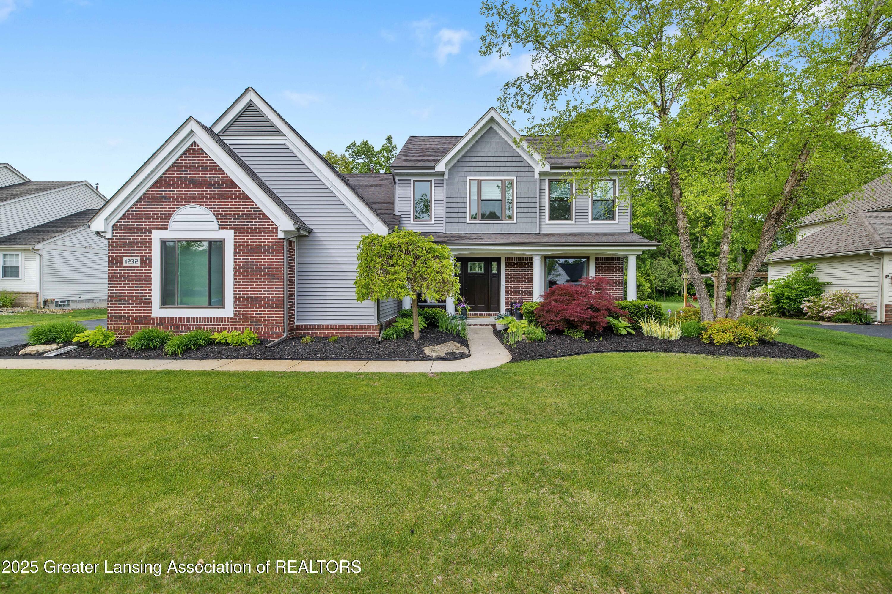 Property Photo:  1232 Chemung Forest Drive  MI 48843 