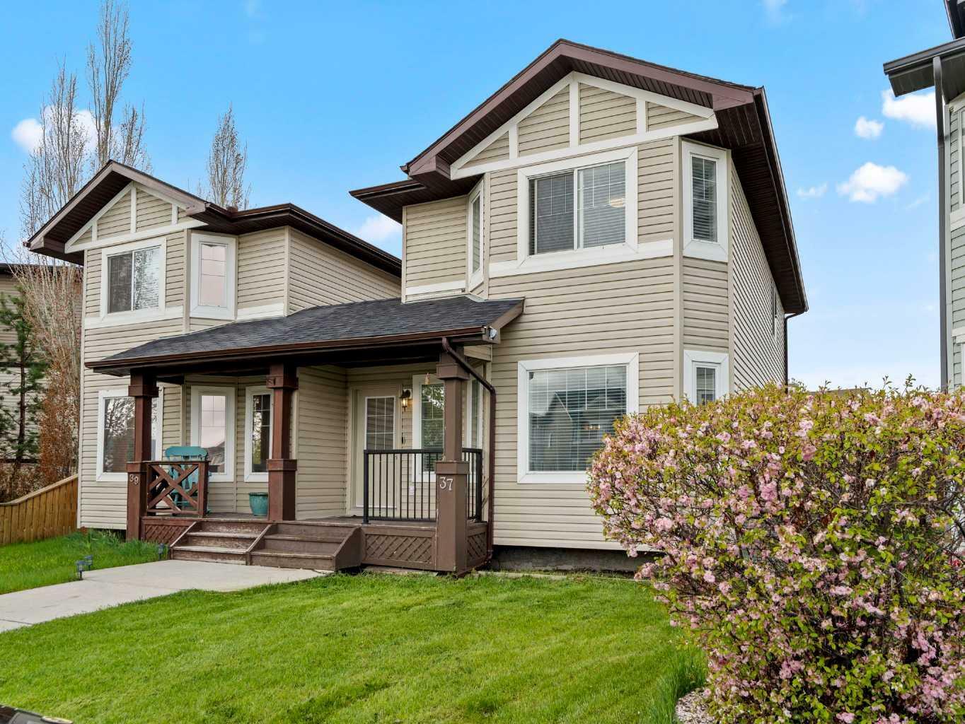 Property Photo: 37 Sunrise Loop SE AB T1V 2B2
