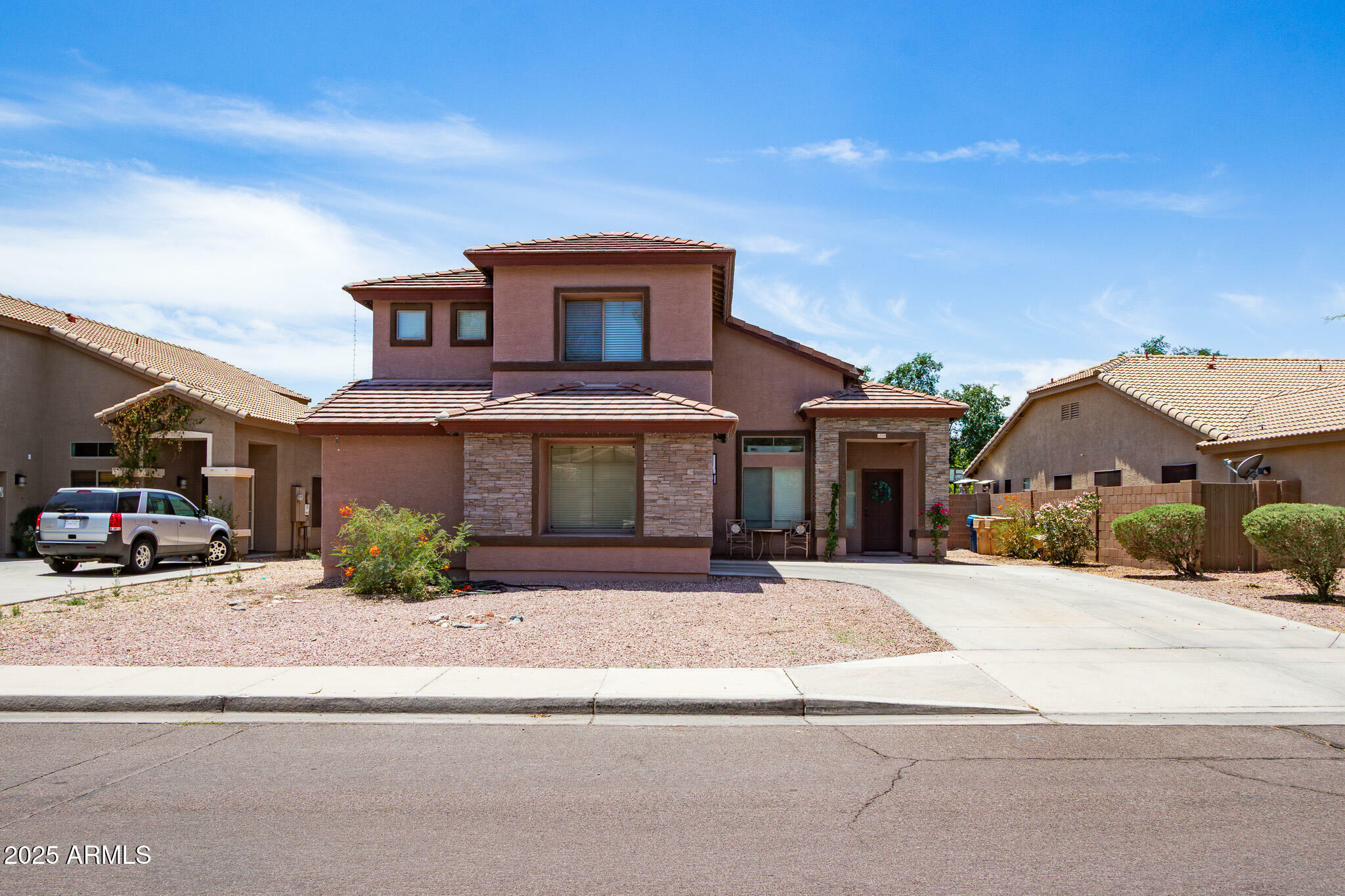 Property Photo: 13709 W Rovey Avenue AZ 85340