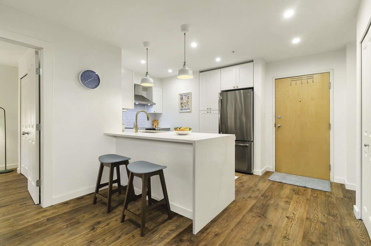 Property Photo: 18 Smokey Smith Place 314 BC V3L 5V3