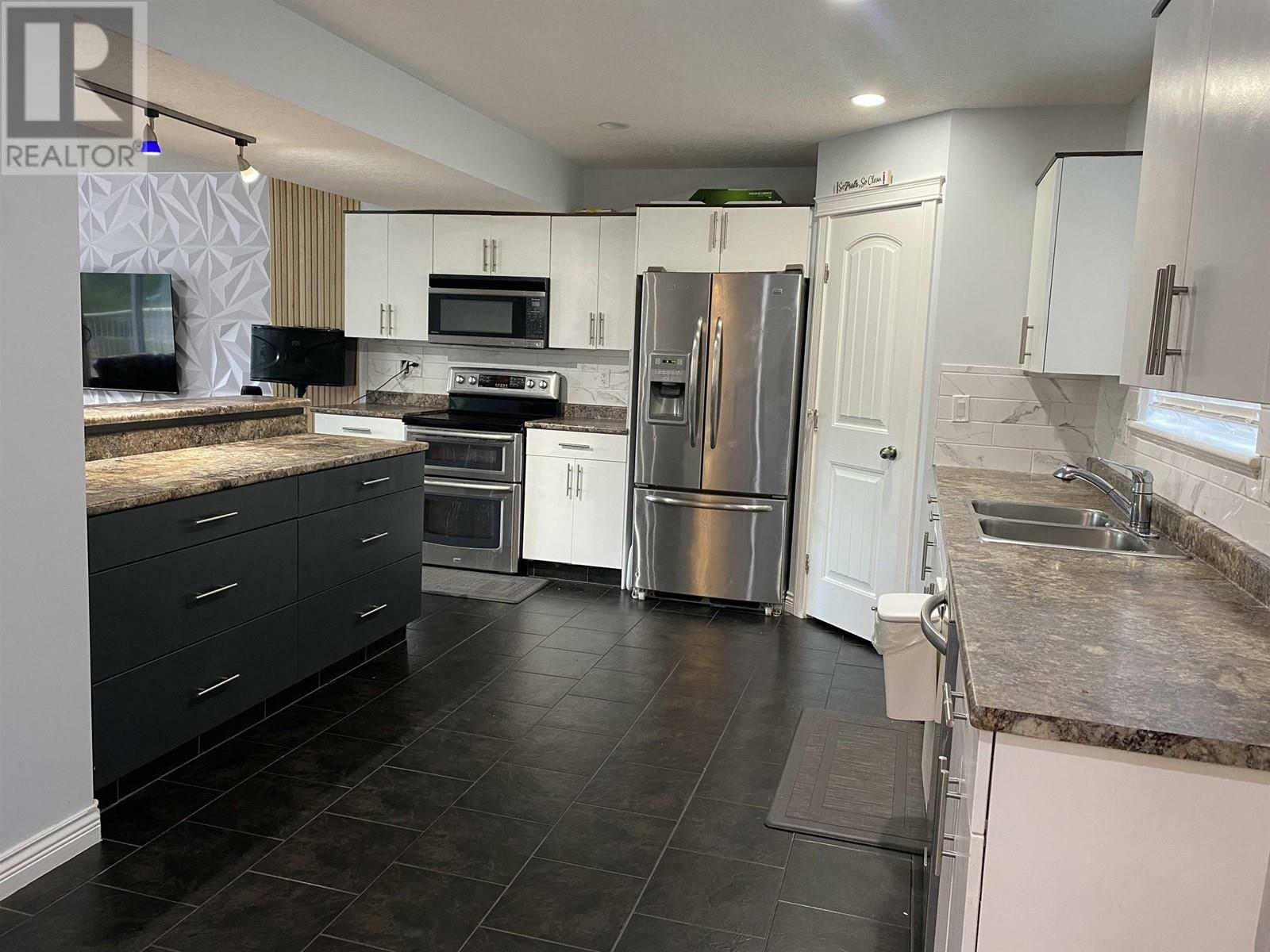 Property Photo: 7415 Creekside Way BC V2N 0C2