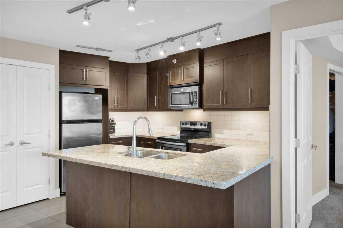 Property Photo: 1939 30 Street SW 308 AB T3E 2L5