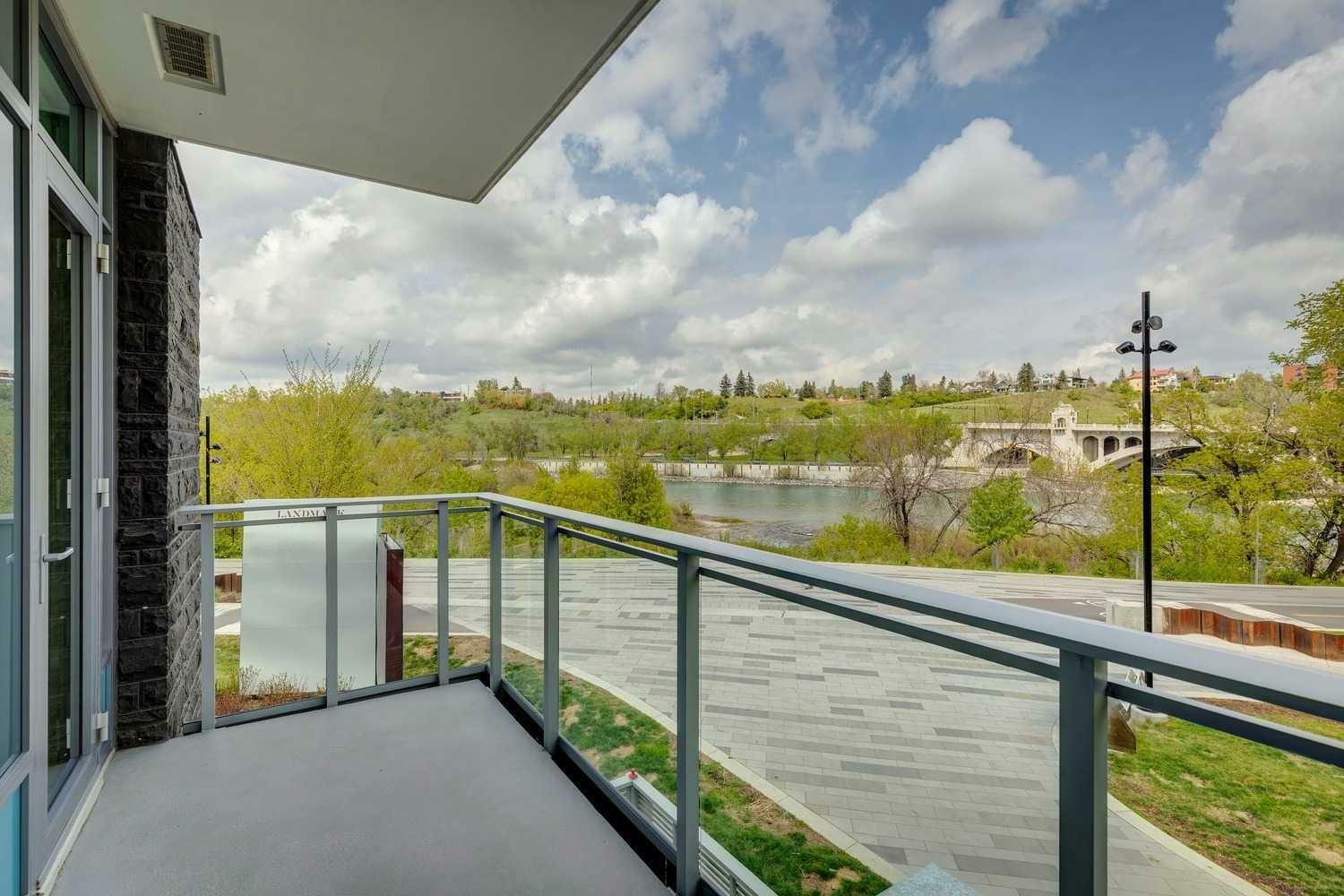 Property Photo: 128 Waterfront Court SW 202 AB T2P 1K9