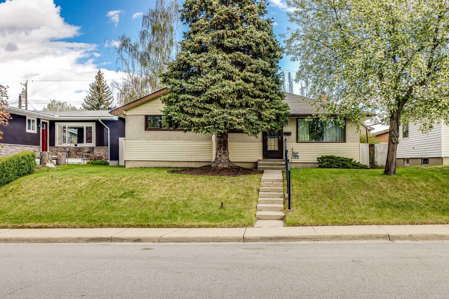 Property Photo: 3440 Caribou Drive NW AB T2L 0S5