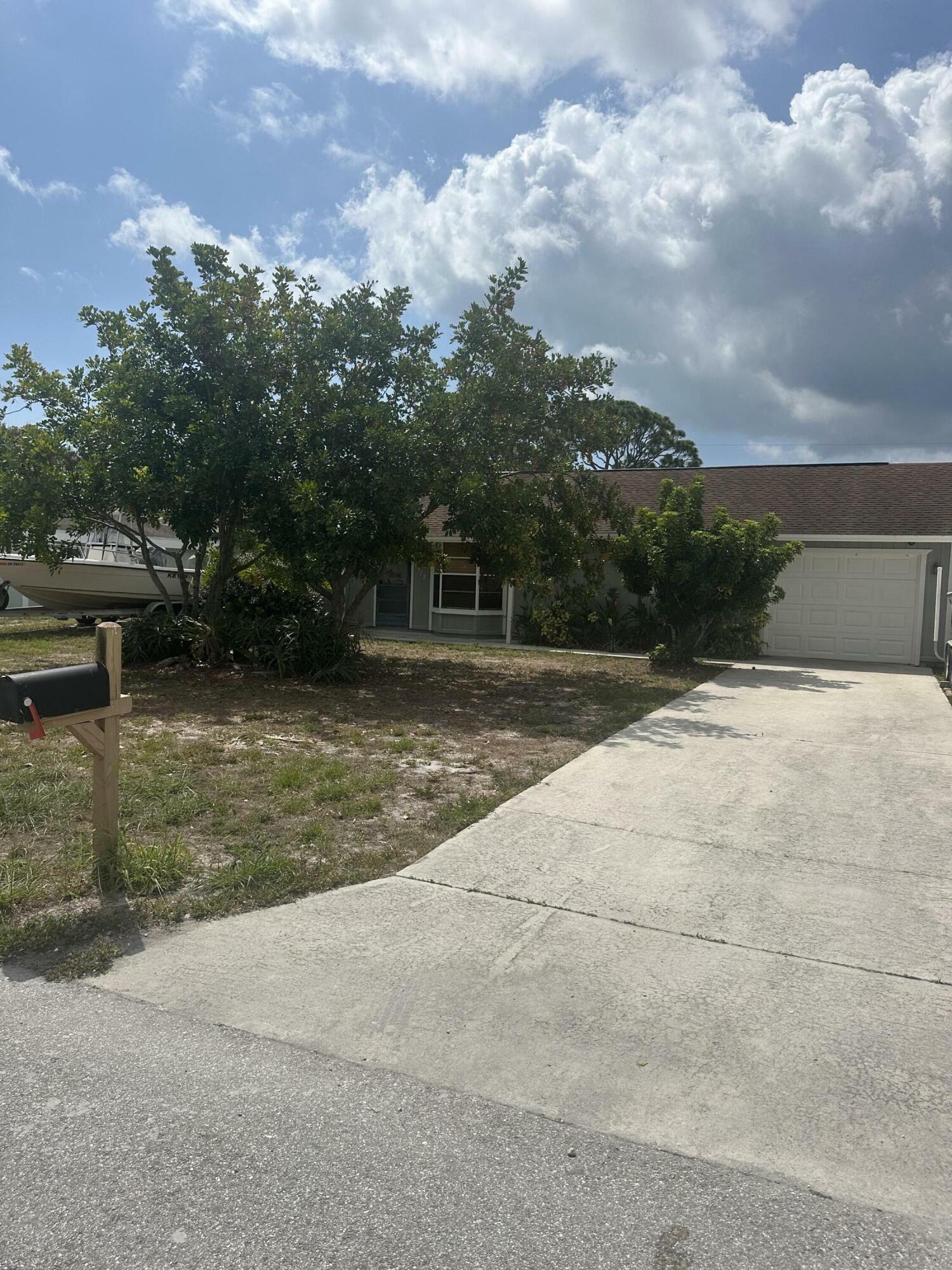 Property Photo: 6472 SE Sherwood Street FL 33455
