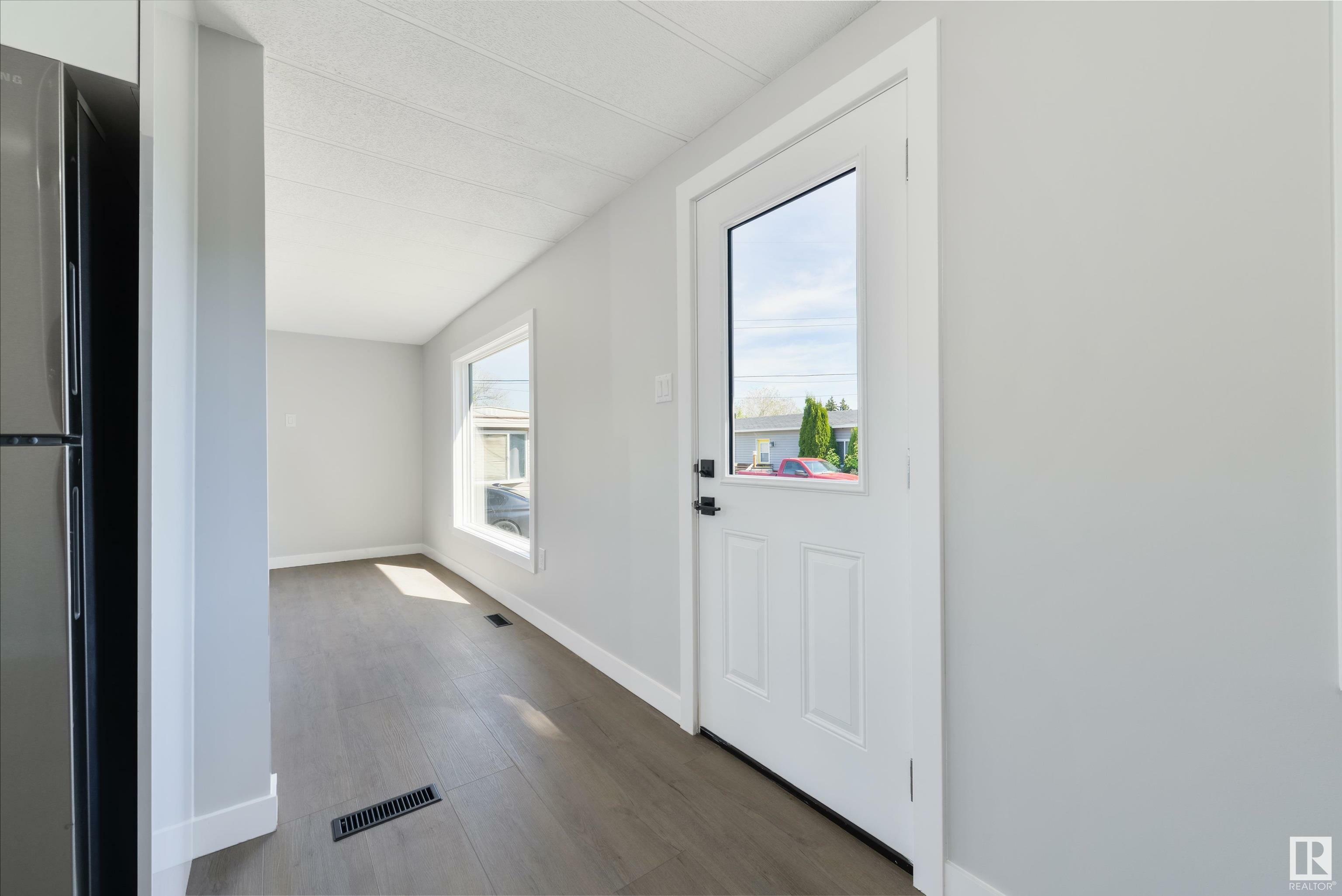 Property Photo: 305 Calahoo Road 100 AB T7X 3K6