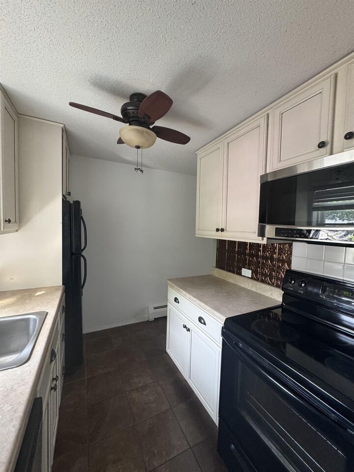 Property Photo: 11 Modena Drive NH 03303