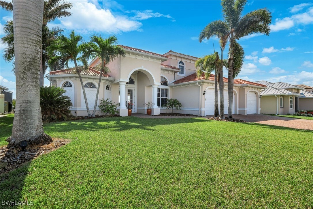 Property Photo: 1128 NW 43rd Avenue FL 33993