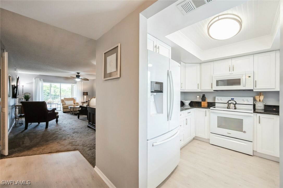 Property Photo: 5651 Rattlesnake Hammock Road C-201 FL 34113