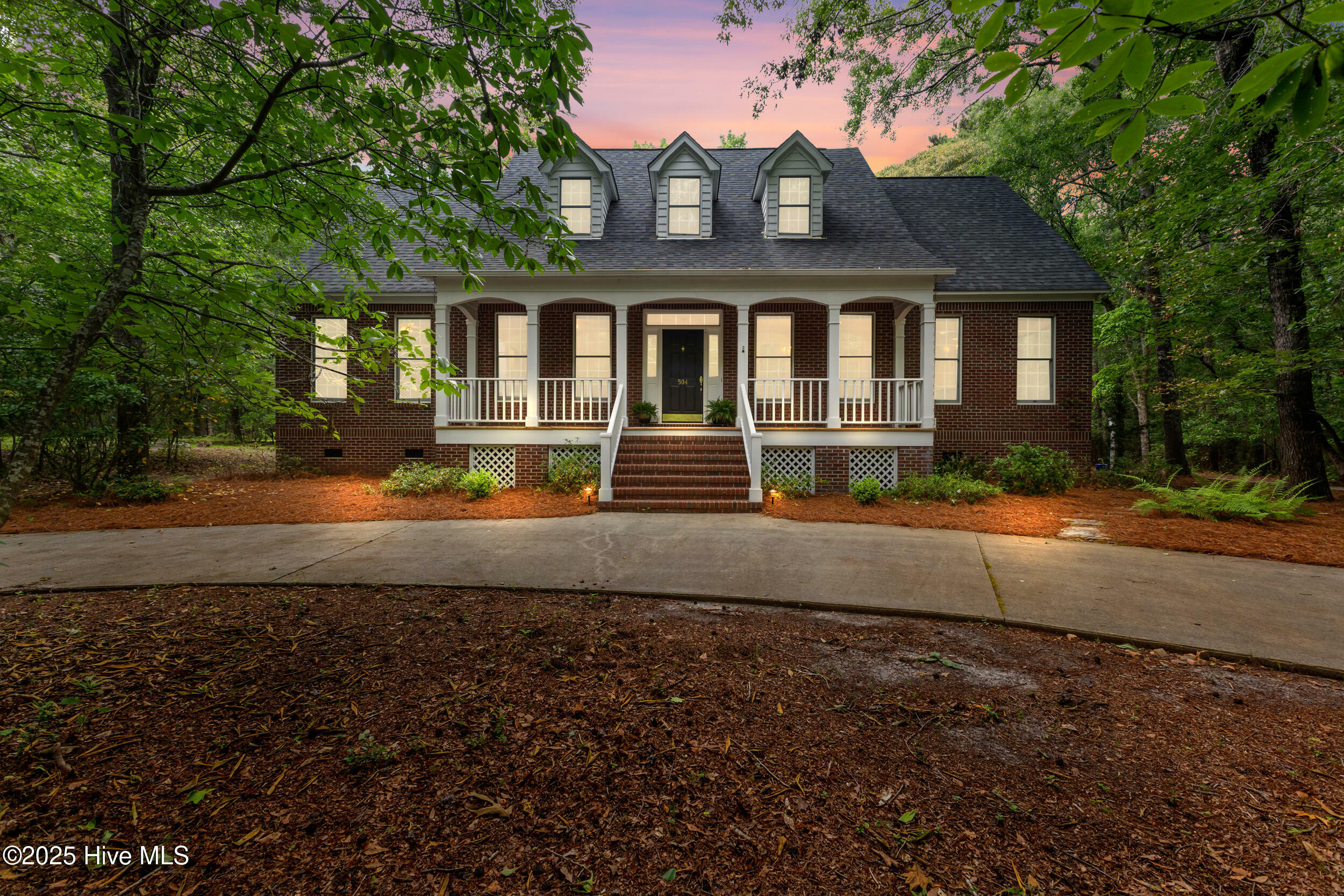 Property Photo:  504 Captain Dexter Wynd  NC 28411 