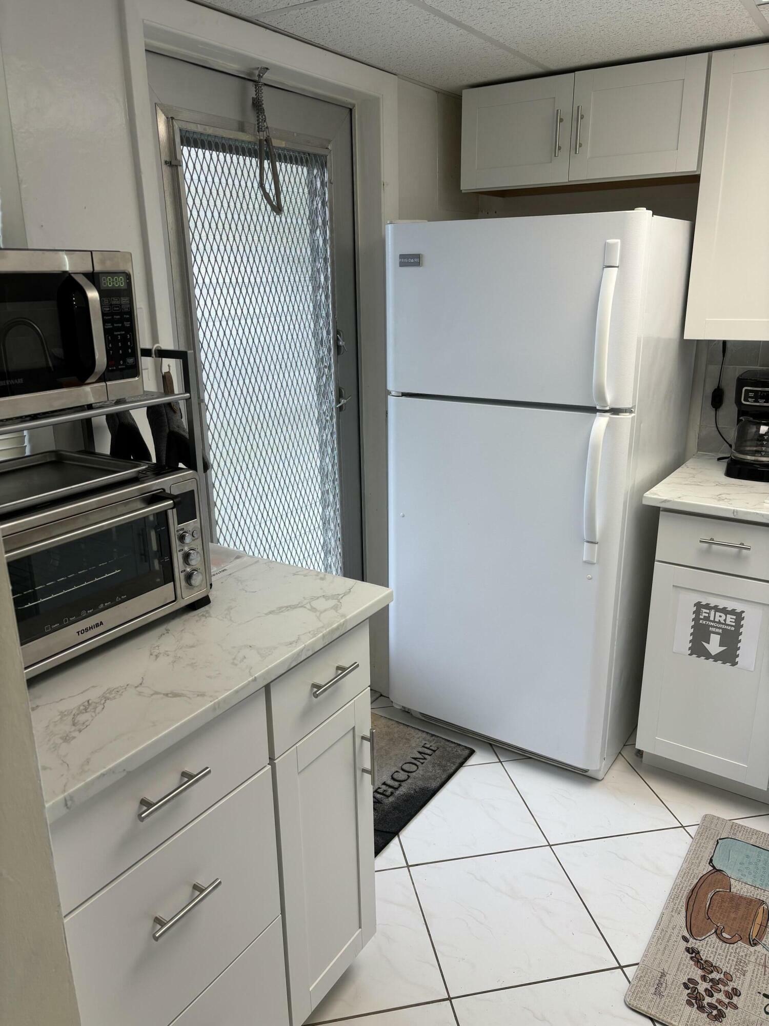 Property Photo: 2191 NE 1st Court 103 FL 33435