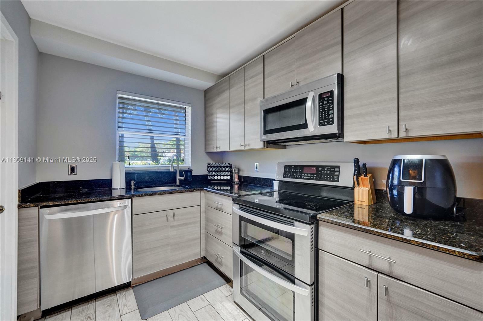 Property Photo:  1775 N Andrews Sq. 104W  FL 33311 