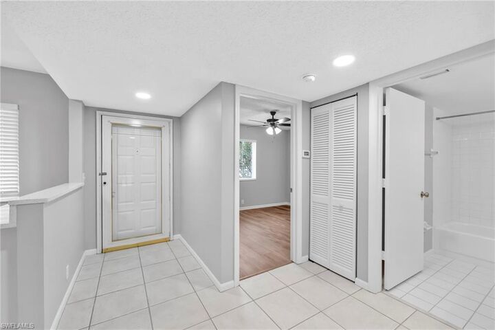 Property Photo:  7791 Esmeralda Way L103  FL 34109 