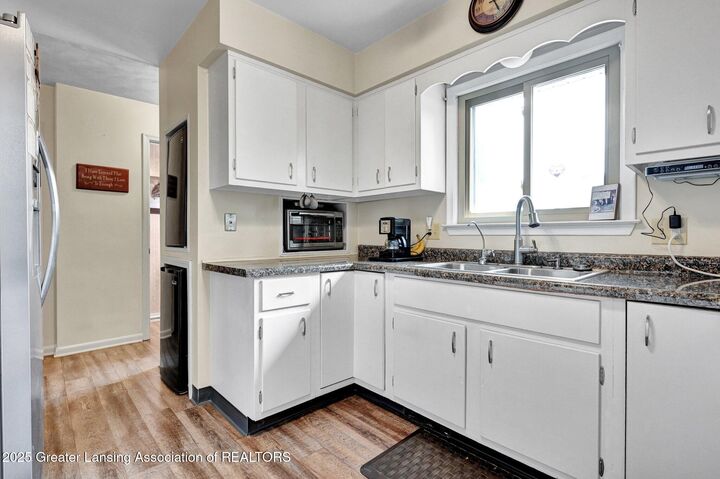 Property Photo:  7713 Jon Scott Drive  MI 48837 