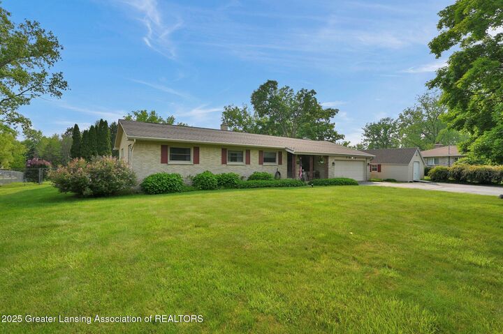 Property Photo:  7713 Jon Scott Drive  MI 48837 