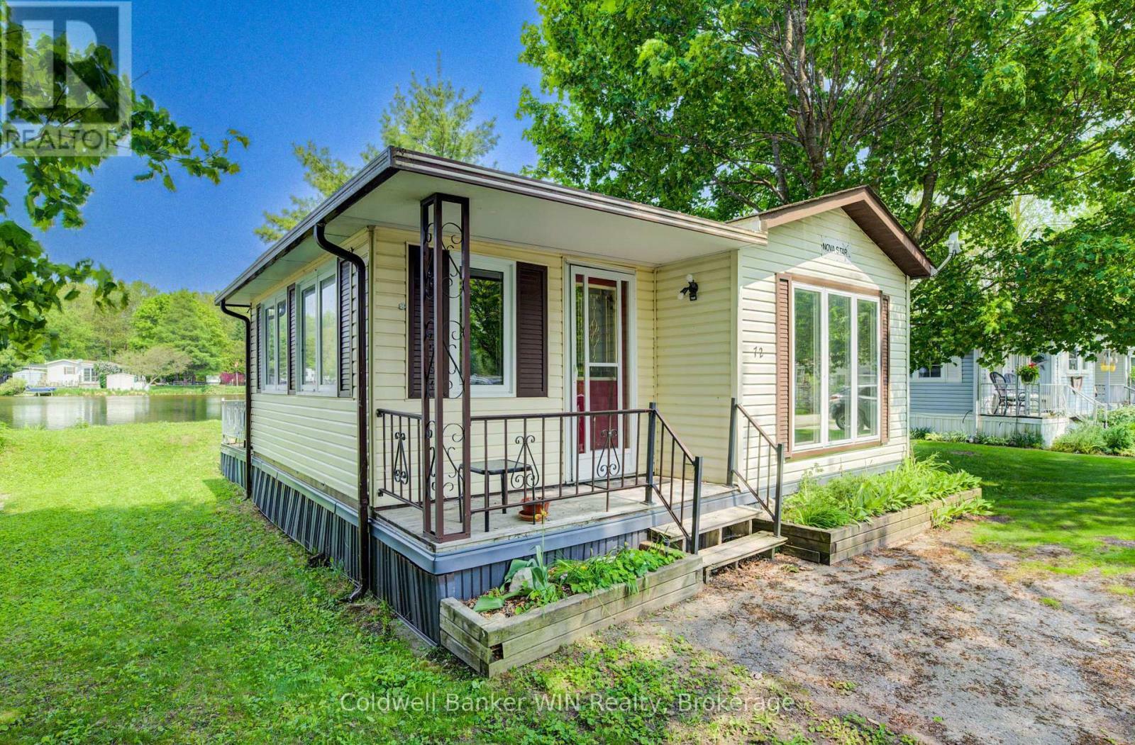 Property Photo: 72 Lakeside, 7489 Side Road 5 E ON N0G 2L0