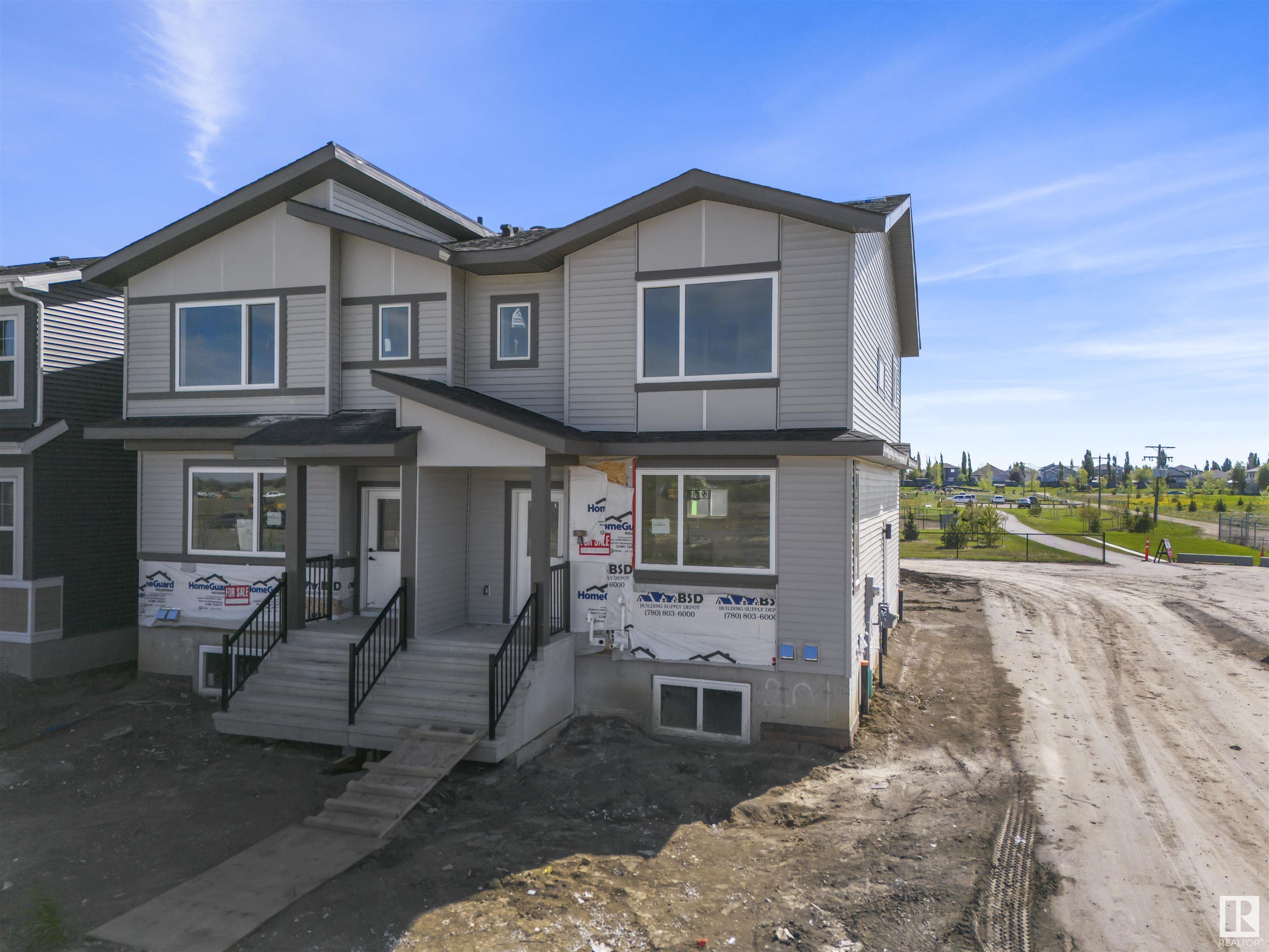 Property Photo: 201 Deer Valley Drive AB T9E 1S8