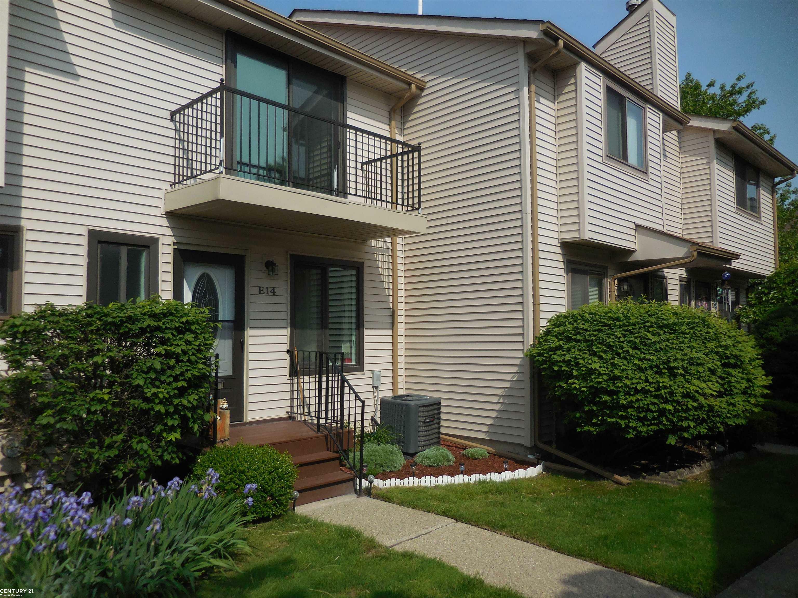 Property Photo: 50676 Jefferson Avenue E-14 MI 48047