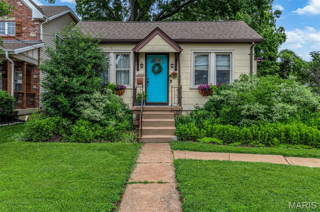 Property Photo:  8905 White Avenue  MO 63144 