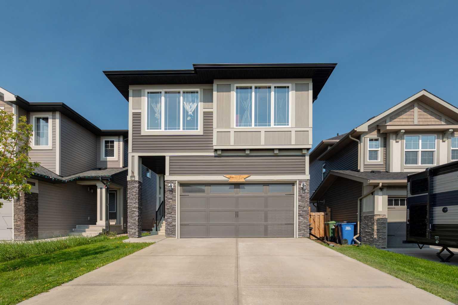 Property Photo: 217 Buckskin Way AB T4C 2R7