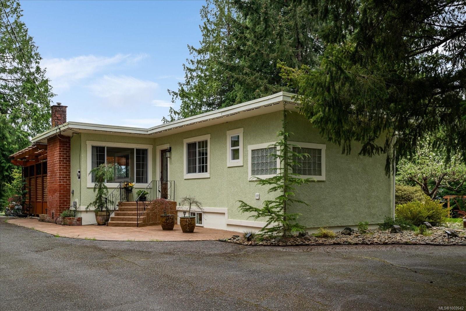 Property Photo: 4800 Island Hwy W BC V9K 1Y9