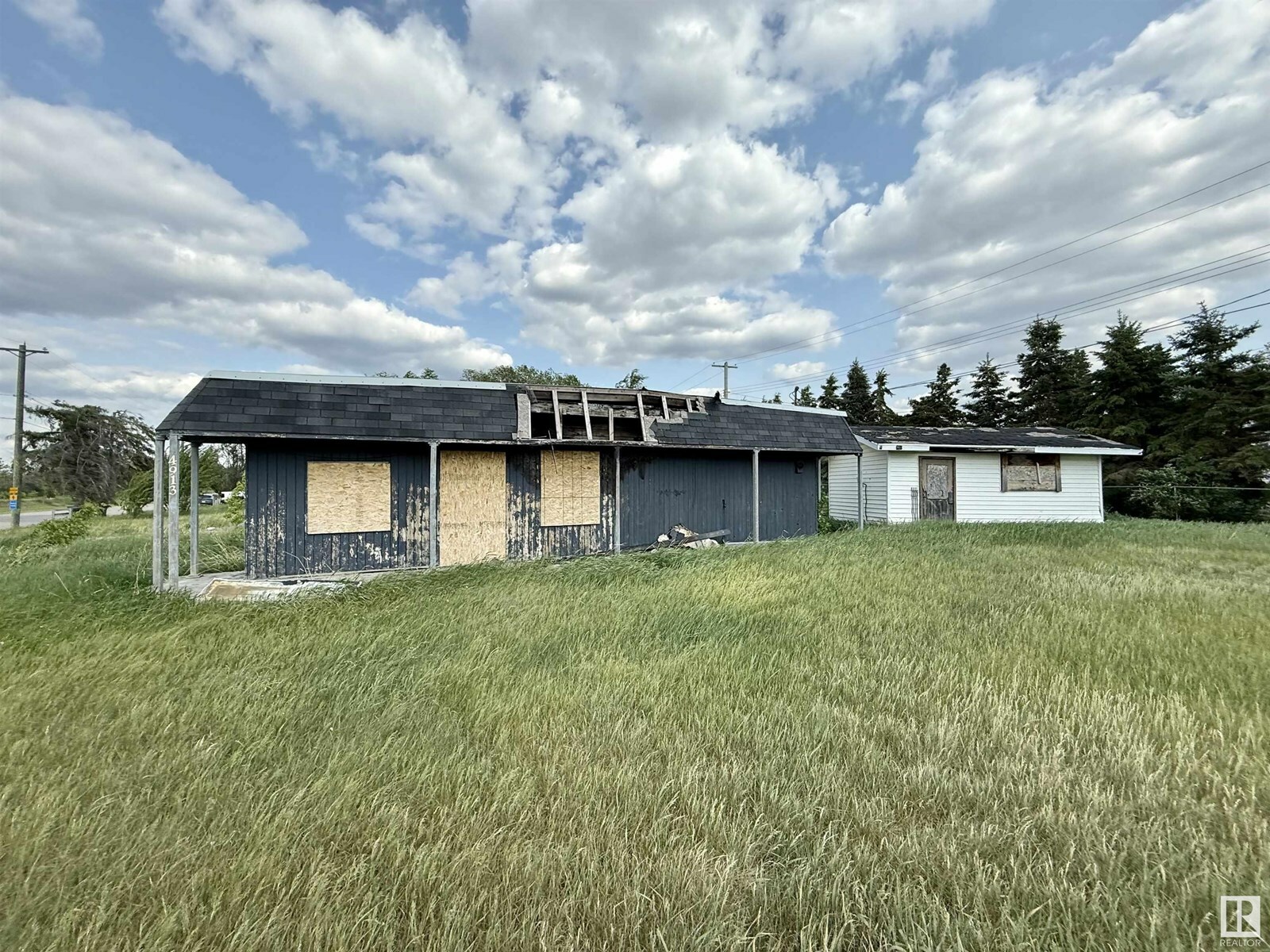 Property Photo:  4913 & 4909 49 Av  AB T0A 1P0 