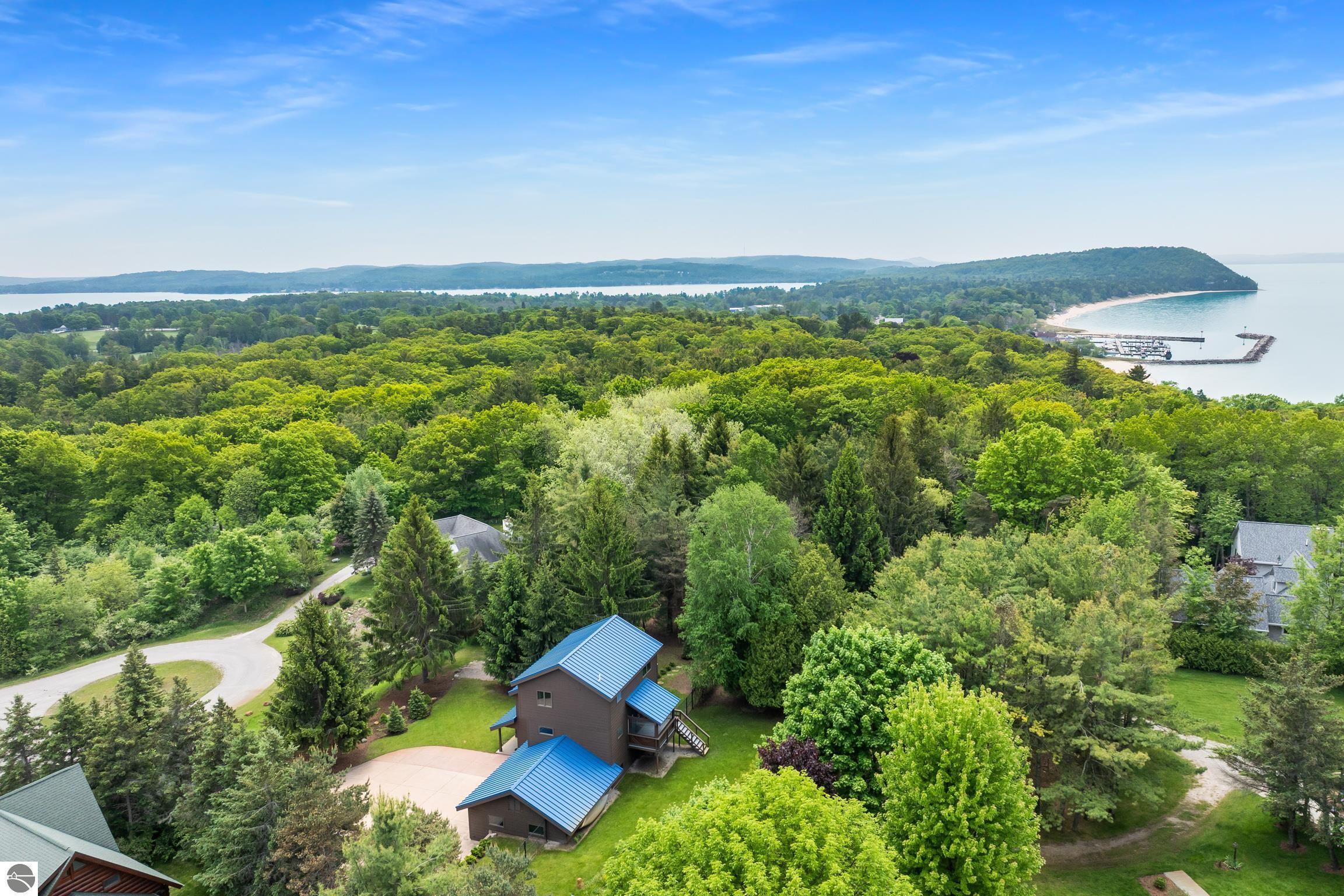 Property Photo:  110 W Terrace Lane Commons  MI 49654 