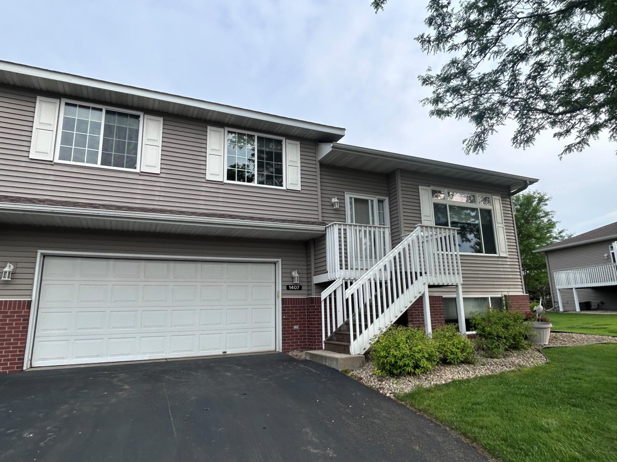 Property Photo:  1407 Presidential Drive  MN 55057 